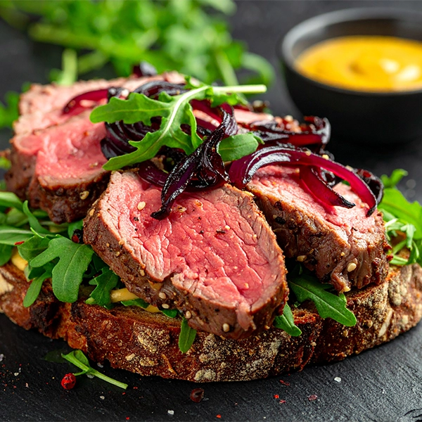 Sliced Steak with Caramelised Red Onions
